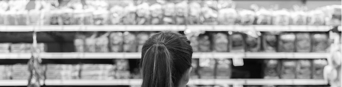 A picture of woman looking at products on shelves